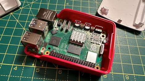 Slide the Raspberry Pi 5 into the case.